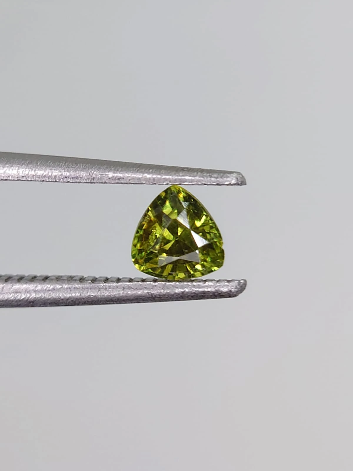 0.46ct Triangular shape Demantoid Garnet From Pakistan — view 2